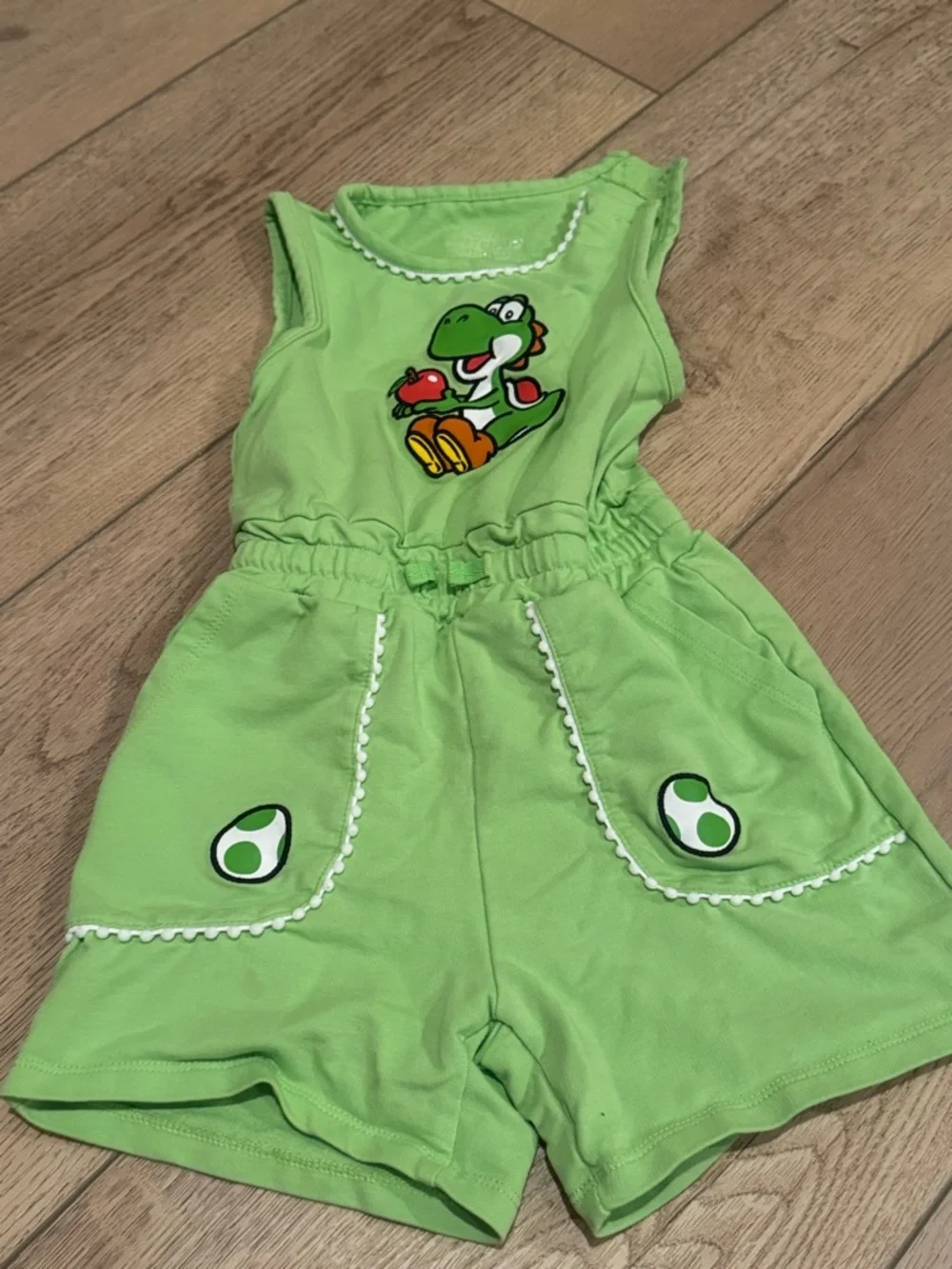 Green Yoshi Graphic Romper. Purchased at Universal.